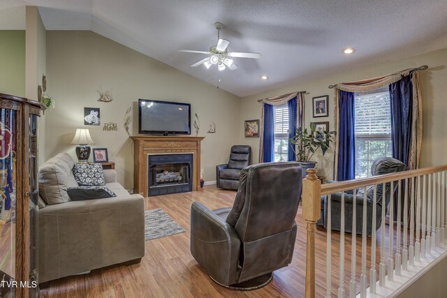 115 Maple Ridge Dr, Jonesborough, TN 37659 - living area with ceiling fan, a fireplace, lofted ceiling, wood finished floors, and recessed lighting