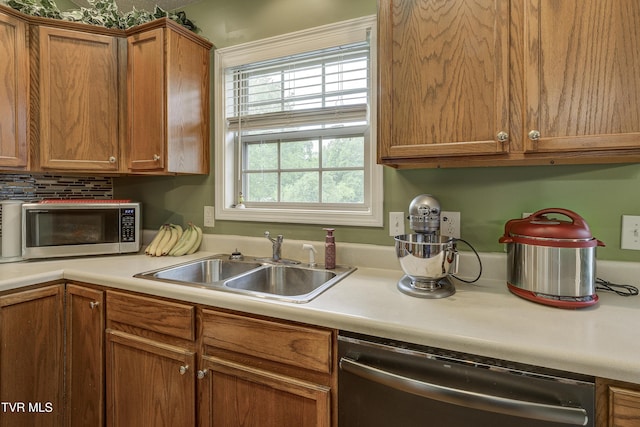 115 Maple Ridge Dr, Jonesborough, TN 37659 - kitchen with appliances with stainless steel finishes, a sink, light countertops, and brown cabinetry