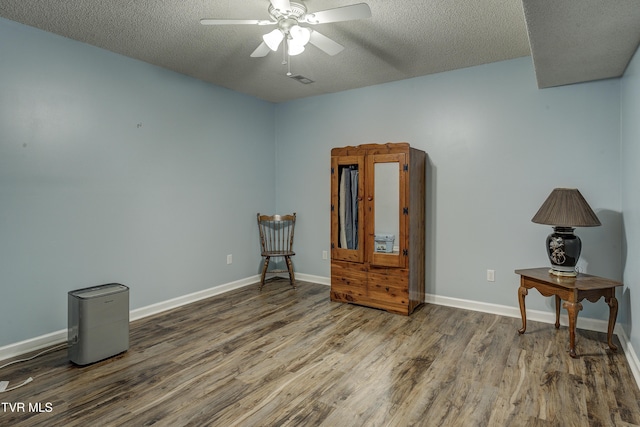 115 Maple Ridge Dr, Jonesborough, TN 37659 - sitting room with wood finished floors, ceiling fan, a textured ceiling, and baseboards