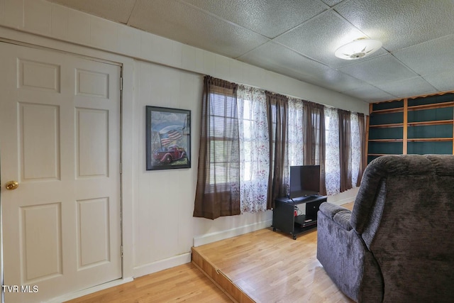 sitting room featuring light wood-style floors and baseboards