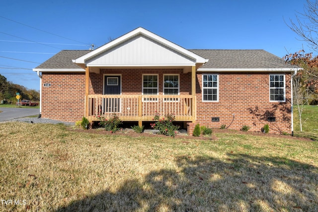 115 Rb Miller Rd, Limestone, TN 37681 - rear view of house featuring covered porch, crawl space, roof with shingles, a lawn, and brick siding