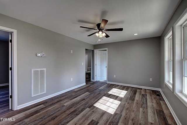 115 Rb Miller Rd, Limestone, TN 37681 - unfurnished bedroom featuring visible vents, a ceiling fan, dark wood-style flooring, and baseboards