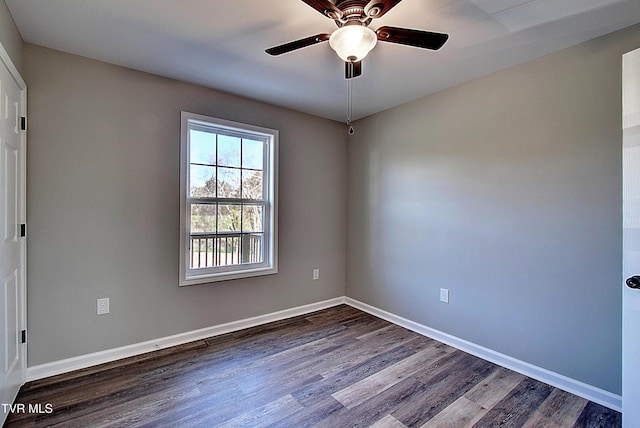 115 Rb Miller Rd, Limestone, TN 37681 - spare room with baseboards, ceiling fan, and dark wood finished floors