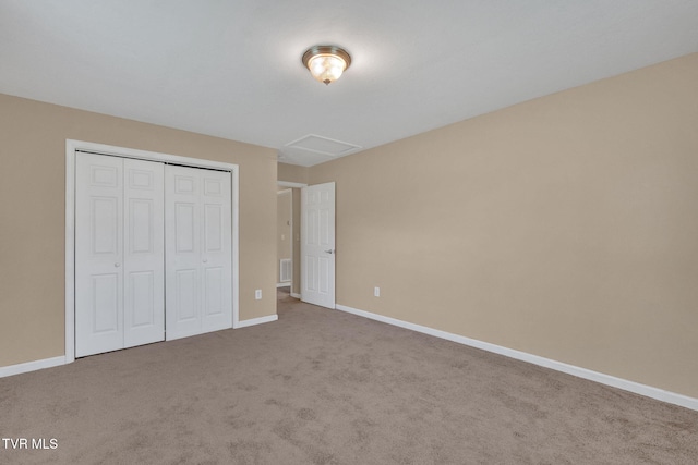 228 Taylor St, Bristol, TN 37620 - unfurnished bedroom with a closet, carpet flooring, baseboards, and visible vents