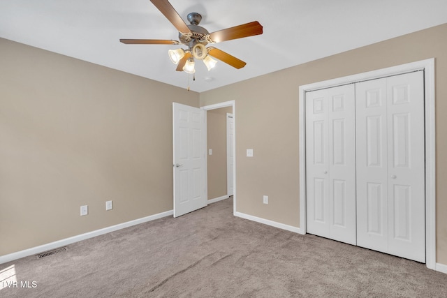 228 Taylor St, Bristol, TN 37620 - unfurnished bedroom with visible vents, a closet, baseboards, ceiling fan, and carpet flooring
