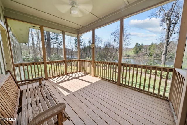 342 Ripshin Lake Rd, Roan Mountain, TN 37687 - unfurnished sunroom featuring a water view and a ceiling fan