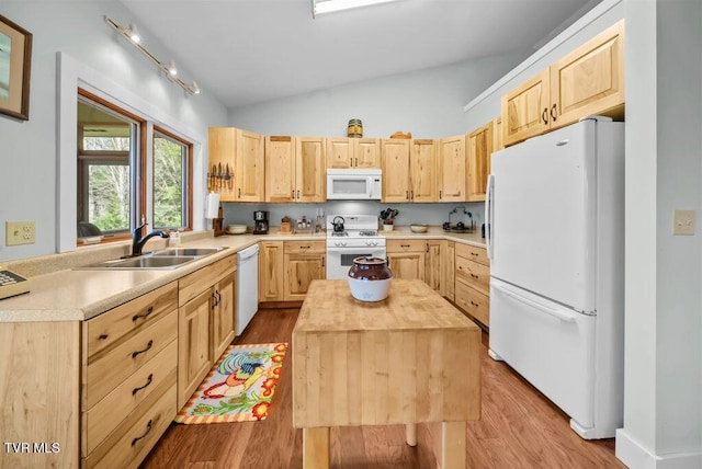 342 Ripshin Lake Rd, Roan Mountain, TN 37687 - kitchen featuring light brown cabinetry, white appliances, and lofted ceiling