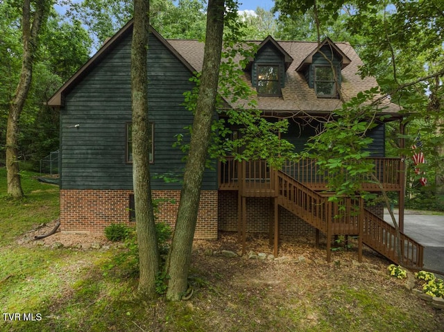 1008 Cox Trail Pl, Kingsport, TN 37660 - view of home's exterior with stairs, roof with shingles, and brick siding