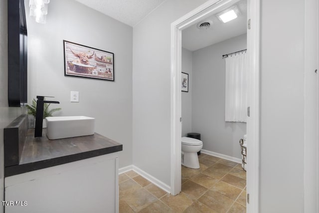 1008 Cox Trail Pl, Kingsport, TN 37660 - bathroom with stone tile flooring and vanity