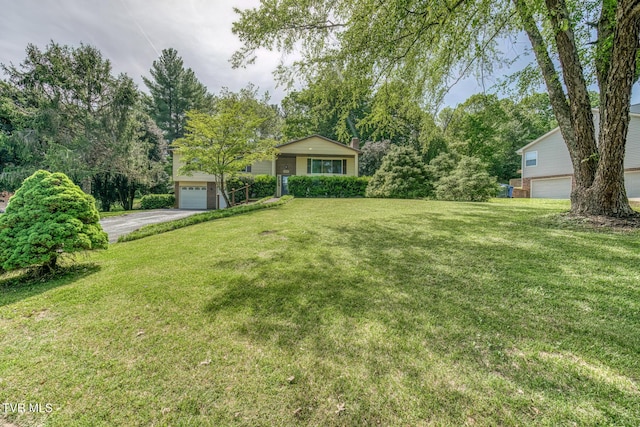 view of yard featuring a garage
