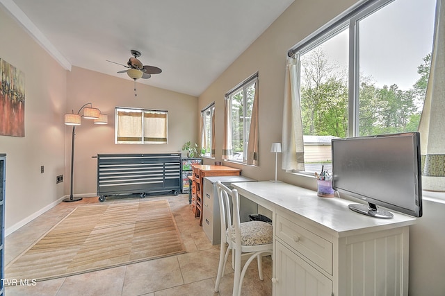 office space featuring ceiling fan, light tile patterned floors, and lofted ceiling