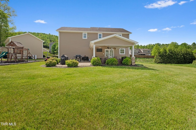 105 Dewey Ct, Bristol, VA 24201 - rear view of house featuring a playground, a ceiling fan, a patio, and a yard