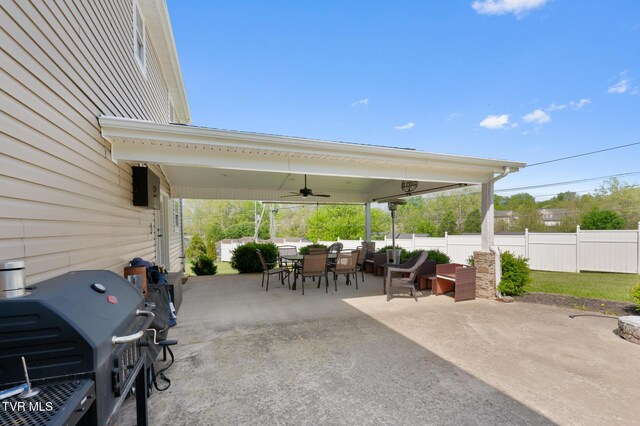 105 Dewey Ct, Bristol, VA 24201 - view of patio featuring fence, a ceiling fan, outdoor dining space, and area for grilling