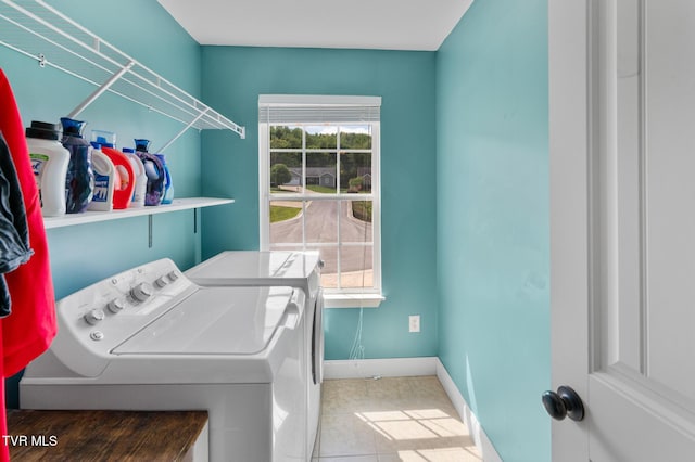 105 Dewey Ct, Bristol, VA 24201 - laundry area with laundry area, baseboards, tile patterned flooring, and separate washer and dryer