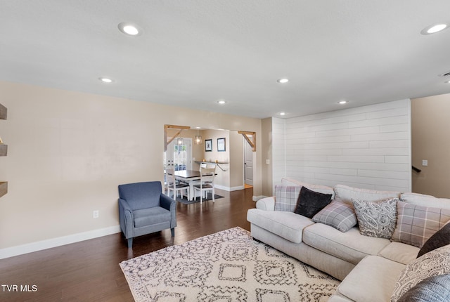 105 Dewey Ct, Bristol, VA 24201 - living area with recessed lighting, baseboards, wood finished floors, and stairway