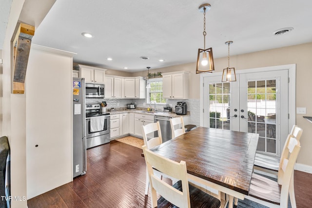 105 Dewey Ct, Bristol, VA 24201 - kitchen with french doors, visible vents, dark wood finished floors, a sink, and stainless steel appliances