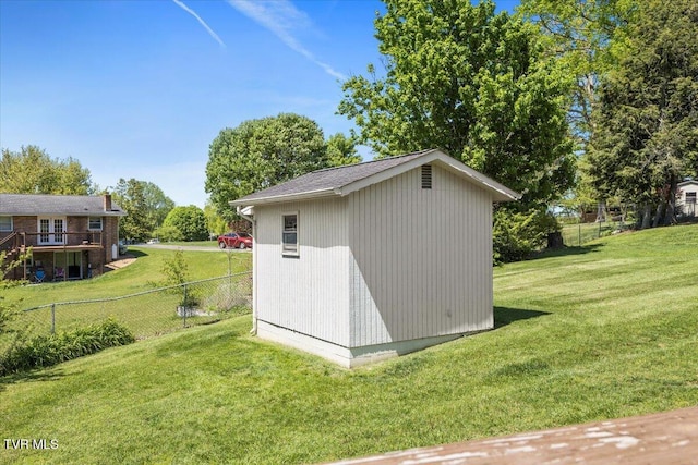 view of shed featuring a fenced backyard