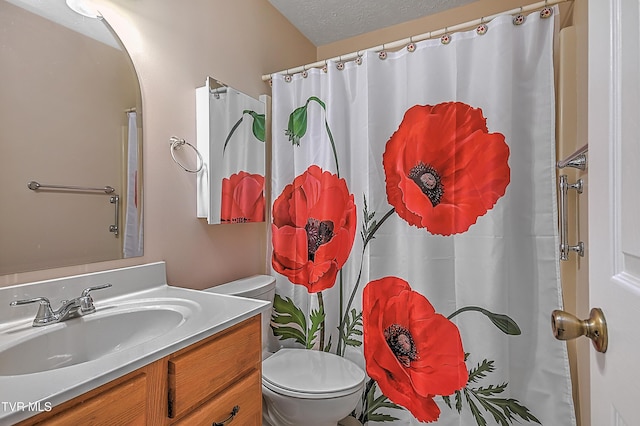 1544 Jessee St Unit S, Kingsport, TN 37664 - bathroom featuring vanity, a textured ceiling, curtained shower, and toilet
