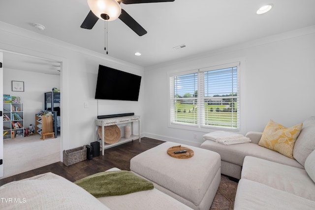 living room with ceiling fan, recessed lighting, wood finished floors, visible vents, and ornamental molding