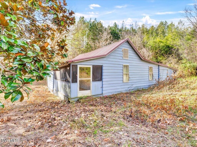 1200 Jackson Hollow Rd, Mosheim, TN 37818 - back of property featuring a sunroom and metal roof