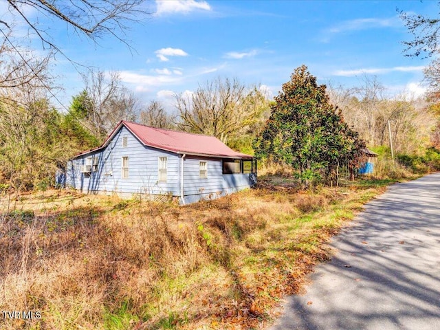 1200 Jackson Hollow Rd, Mosheim, TN 37818 - view of property exterior featuring metal roof