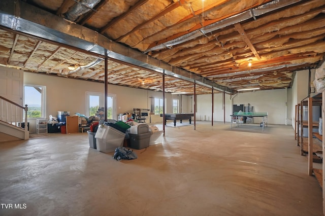 below grade area featuring stairs and billiards