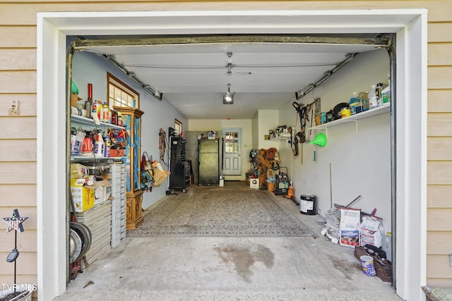 368 Burbank Rd, Roan Mountain, TN 37687 - garage with freestanding refrigerator