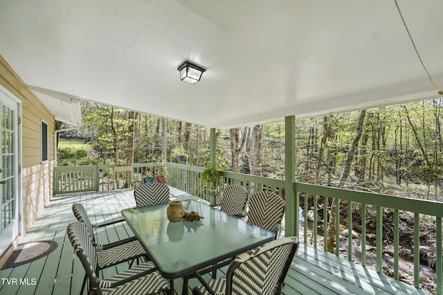 368 Burbank Rd, Roan Mountain, TN 37687 - sunroom featuring outdoor dining space