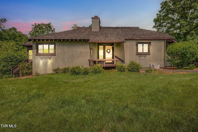 100 Periwinkle Pl Unit 100, Kingsport, TN 37660 - view of front of house featuring a chimney and a lawn