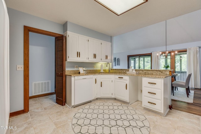 100 Periwinkle Pl Unit 100, Kingsport, TN 37660 - kitchen featuring dishwasher, a peninsula, white cabinets, a sink, and light stone countertops