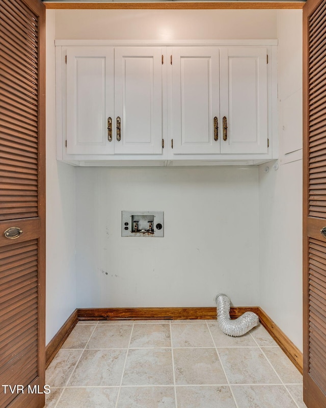 100 Periwinkle Pl Unit 100, Kingsport, TN 37660 - laundry area featuring cabinet space, baseboards, and washer hookup