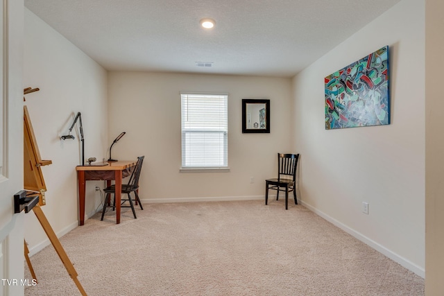 living area featuring carpet floors, baseboards, and visible vents