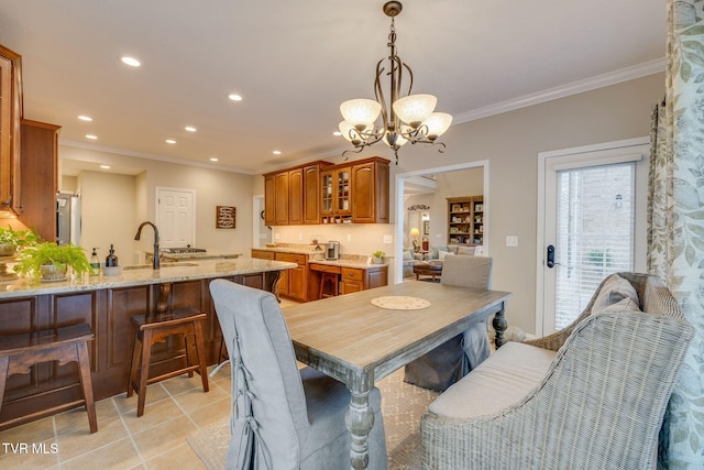 dining room featuring crown molding, recessed lighting, light tile patterned floors, and a chandelier