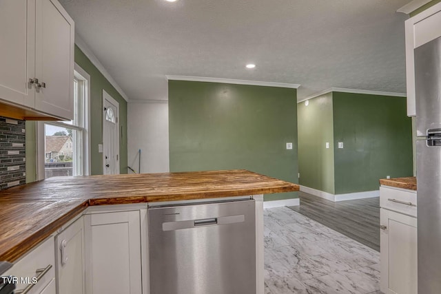 954 Maple St, Kingsport, TN 37660 - kitchen featuring butcher block countertops, stainless steel appliances, ornamental molding, white cabinets, and a textured ceiling