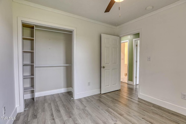 954 Maple St, Kingsport, TN 37660 - unfurnished bedroom featuring wood finished floors, ornamental molding, a closet, and a ceiling fan