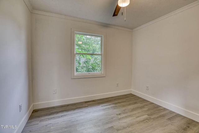 954 Maple St, Kingsport, TN 37660 - empty room featuring wood finished floors, a ceiling fan, and ornamental molding