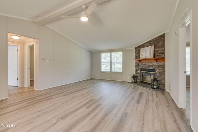 unfurnished living room featuring crown molding, lofted ceiling with beams, light wood-style floors, and a ceiling fan
