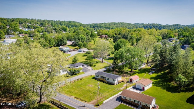 aerial view featuring a view of trees