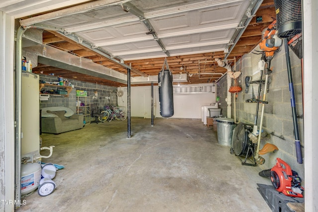 unfinished basement featuring washer / clothes dryer