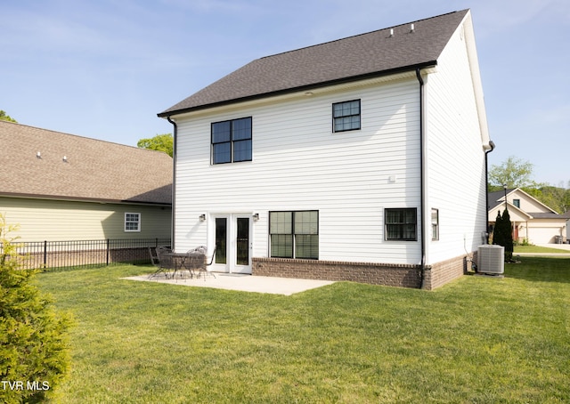 2834 Mccoy St, Kingsport, TN 37664 - back of property with a yard, a patio, fence, and central AC unit