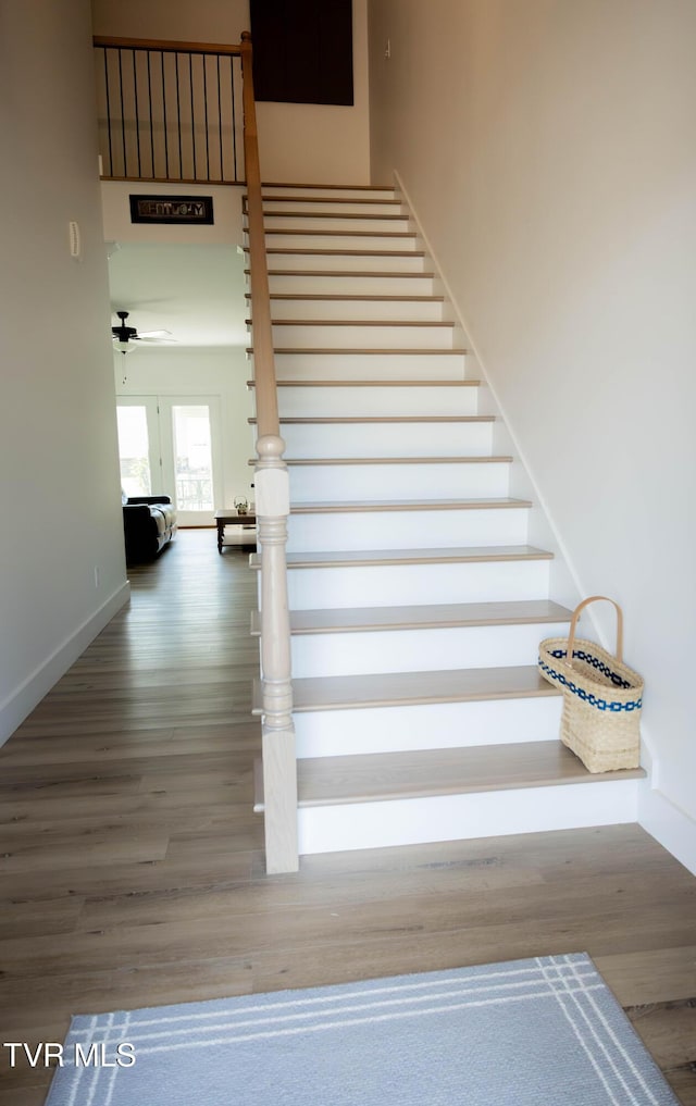 2834 Mccoy St, Kingsport, TN 37664 - stairs with baseboards and wood finished floors