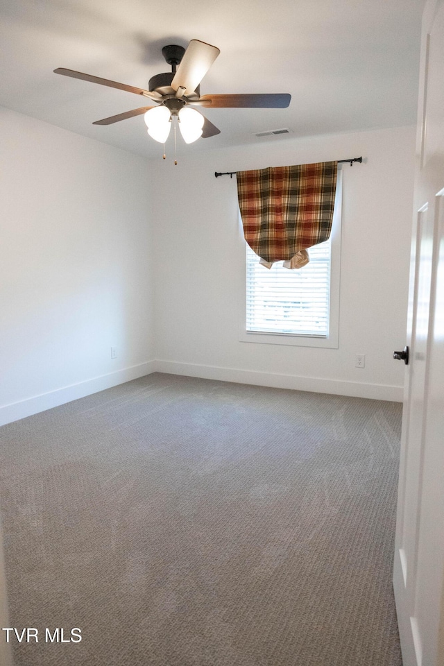 2834 Mccoy St, Kingsport, TN 37664 - spare room with visible vents, a ceiling fan, baseboards, and carpet floors