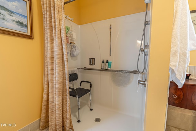 full bath featuring a stall shower