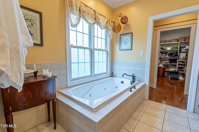 full bath featuring a whirlpool tub