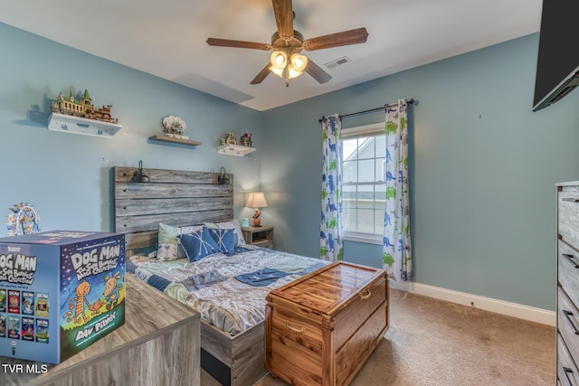 bedroom with baseboards, carpet, a ceiling fan, and visible vents