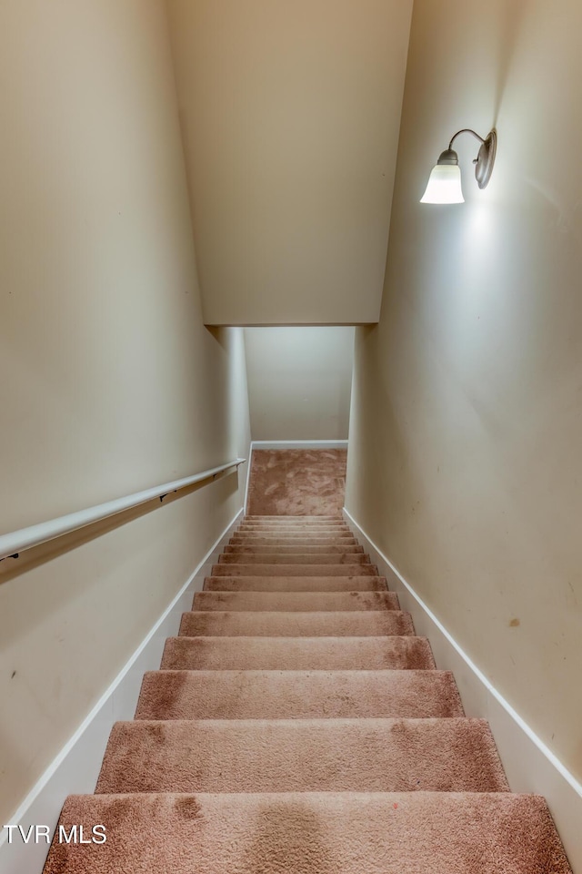 staircase with baseboards