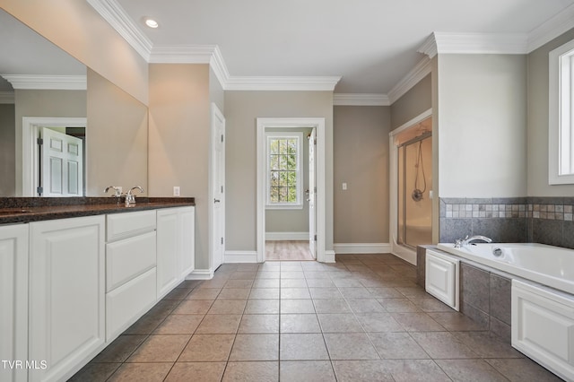 500 NW Ridge Ave, Norton, VA 24273 - bathroom with ornamental molding, a shower stall, a bath, baseboards, and double vanity