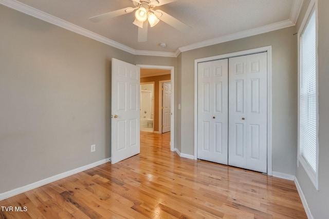 241 Stone Edge Cir, Kingsport, TN 37660 - unfurnished bedroom with light wood-style floors, ornamental molding, baseboards, and a closet