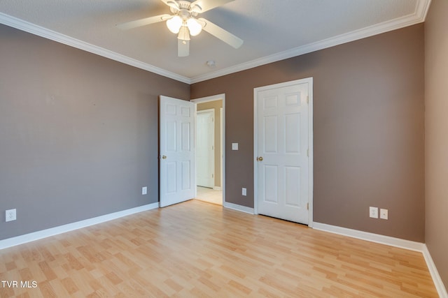 241 Stone Edge Cir, Kingsport, TN 37660 - unfurnished bedroom featuring a ceiling fan, baseboards, ornamental molding, and light wood-style floors