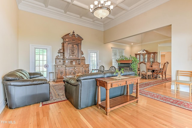 2304 Granite Dr, Johnson City, TN 37604 - living area with a high ceiling, beam ceiling, a chandelier, light wood-style flooring, and coffered ceiling
